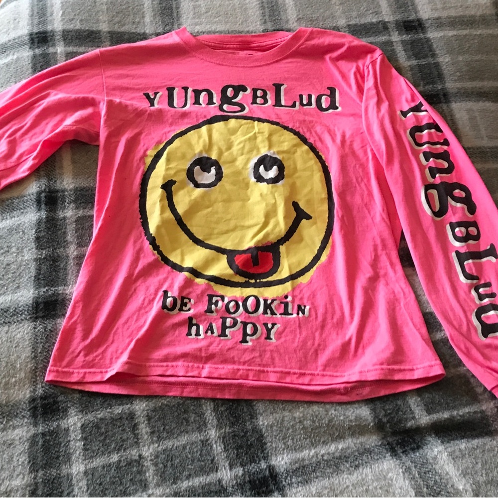 T shirt, worn a couple of times, and there are a couple of spots on the front
